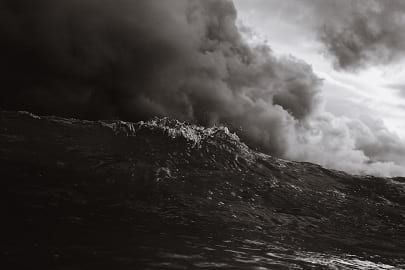 dark storm clouds threatening a roiling sea